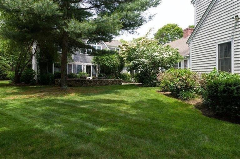 414 Eel River Road Osterville, MA 02655 - Photo 18 of 23 a view of a house with a big yard and large trees