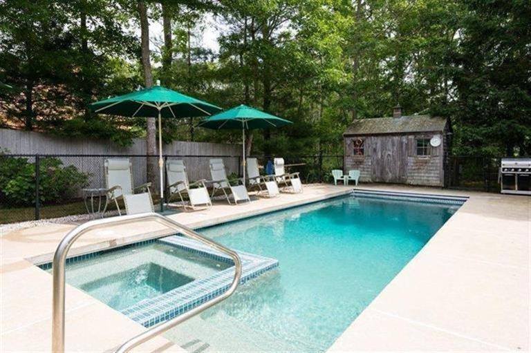 414 Eel River Road Osterville, MA 02655 - Photo 22 of 23 a view of swimming pool with outdoor seating and trees