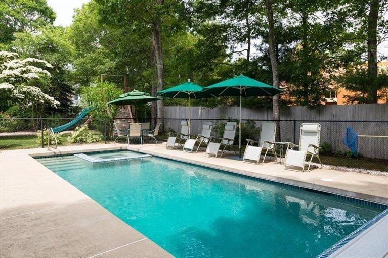 414 Eel River Road Osterville, MA 02655 - Photo 23 of 23 a view of a swimming pool with a patio