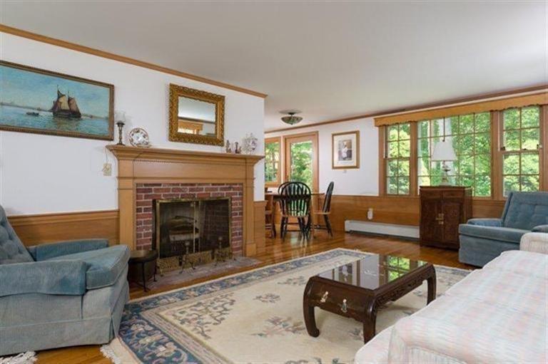 414 Eel River Road Osterville, MA 02655 - Photo 5 of 23 a living room with furniture and a fireplace
