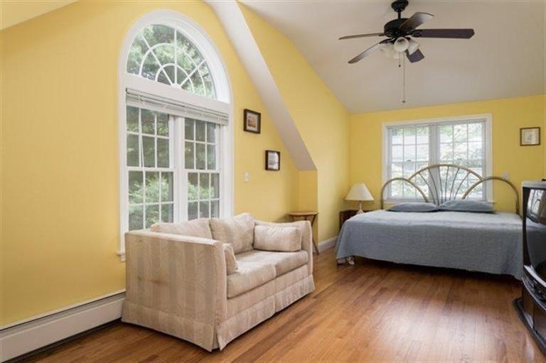 414 Eel River Road Osterville, MA 02655 - Photo 10 of 23 a living room with furniture and a window
