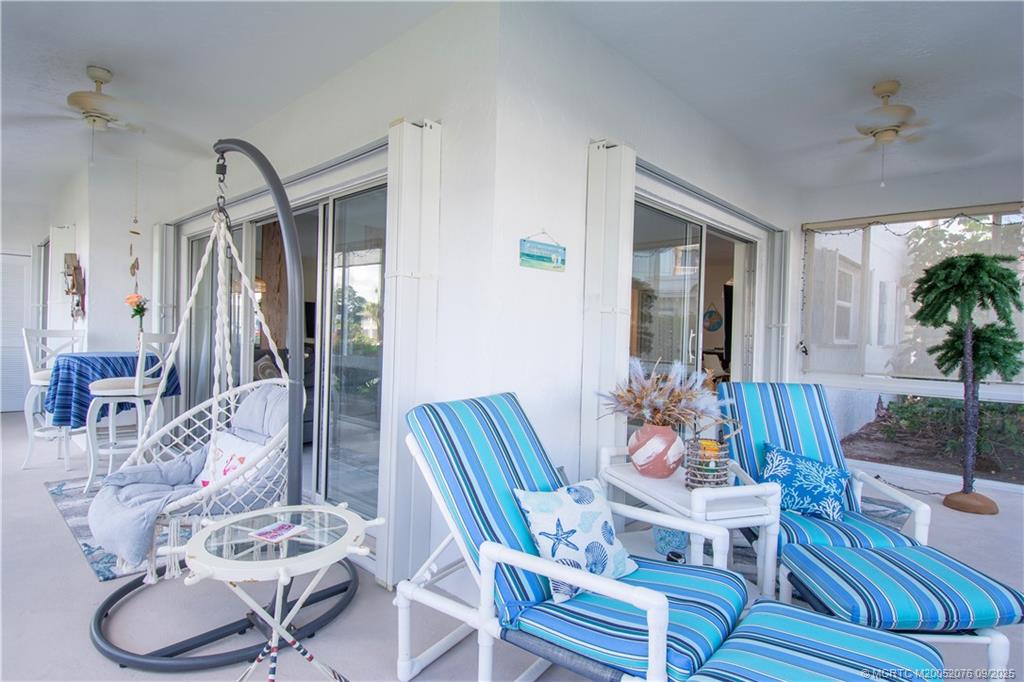 1866 Southwest Palm City Road, Unit 101 Stuart, FL 34994 - Photo 18 of 23 a view of a livingroom and dining room