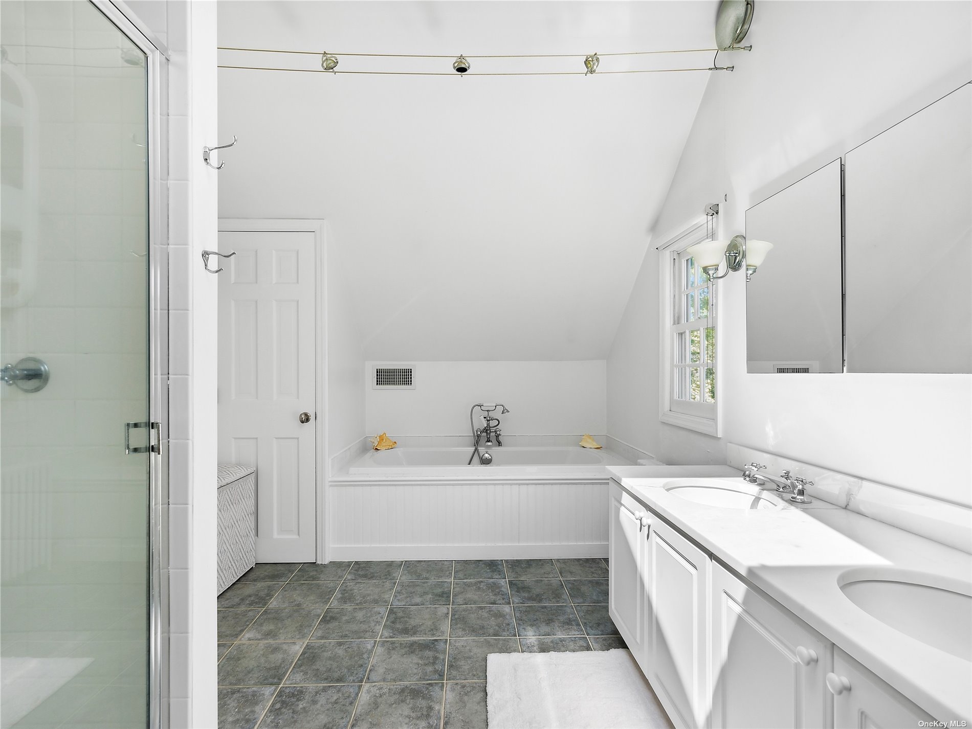 41 East Hampton, undefined 00000 - Photo 12 of 14 a bathroom with a sink a toilet and shower