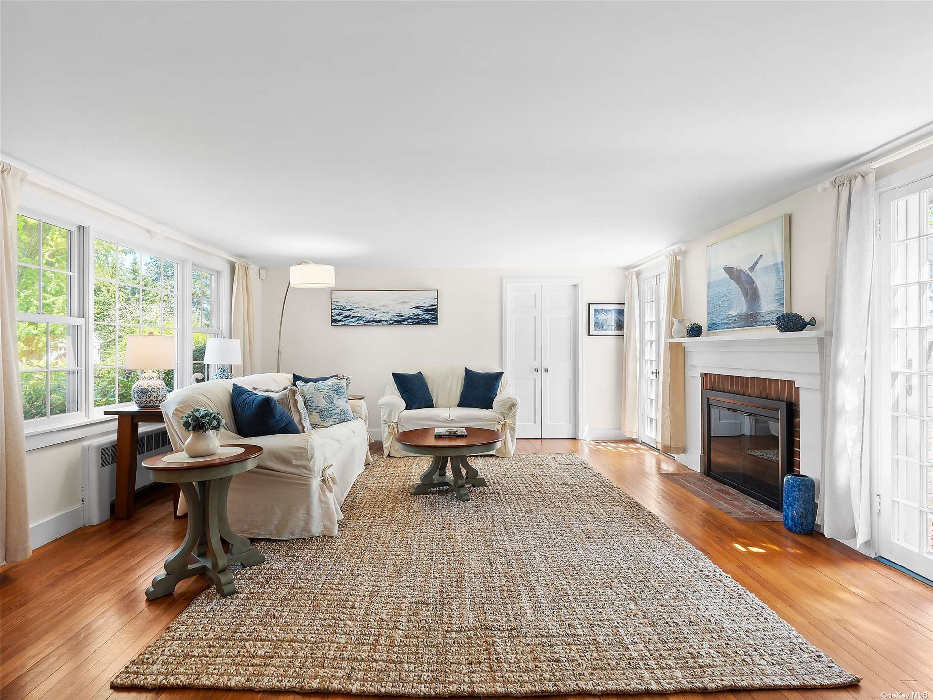 41 East Hampton, undefined 00000 - Photo 2 of 14 a living room with furniture and a fireplace