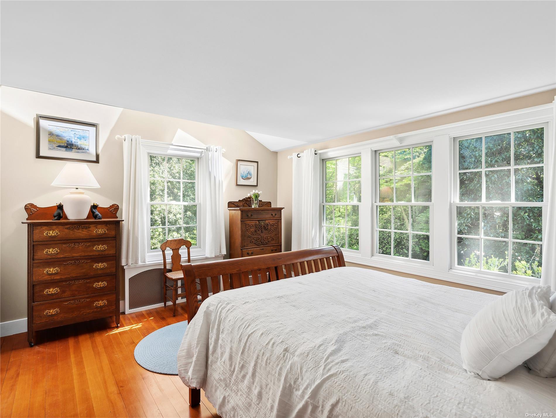 41 East Hampton, undefined 00000 - Photo 6 of 14 a bedroom with a bed and a dresser