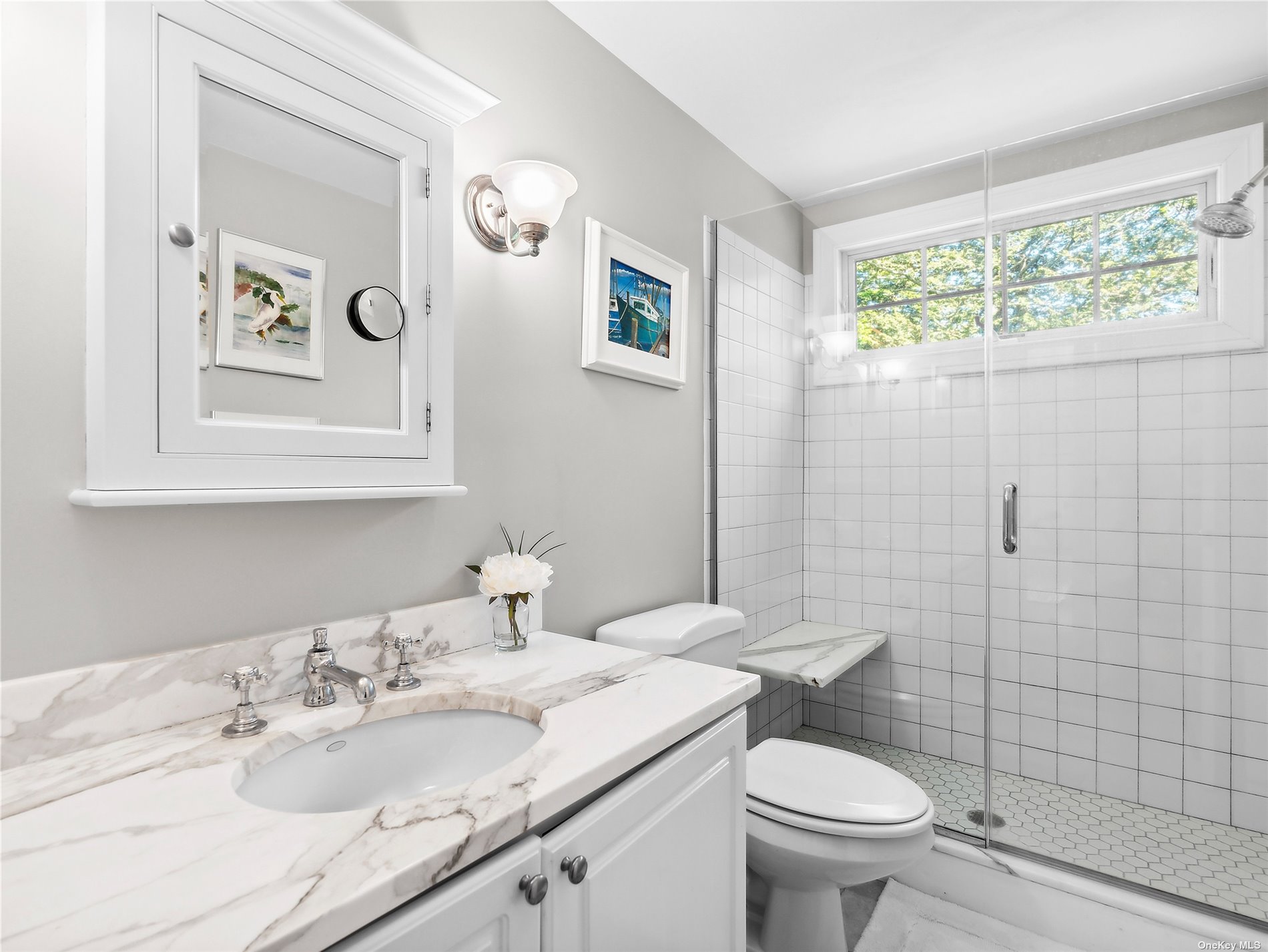 41 East Hampton, undefined 00000 - Photo 10 of 14 a bathroom with a granite countertop toilet sink and mirror