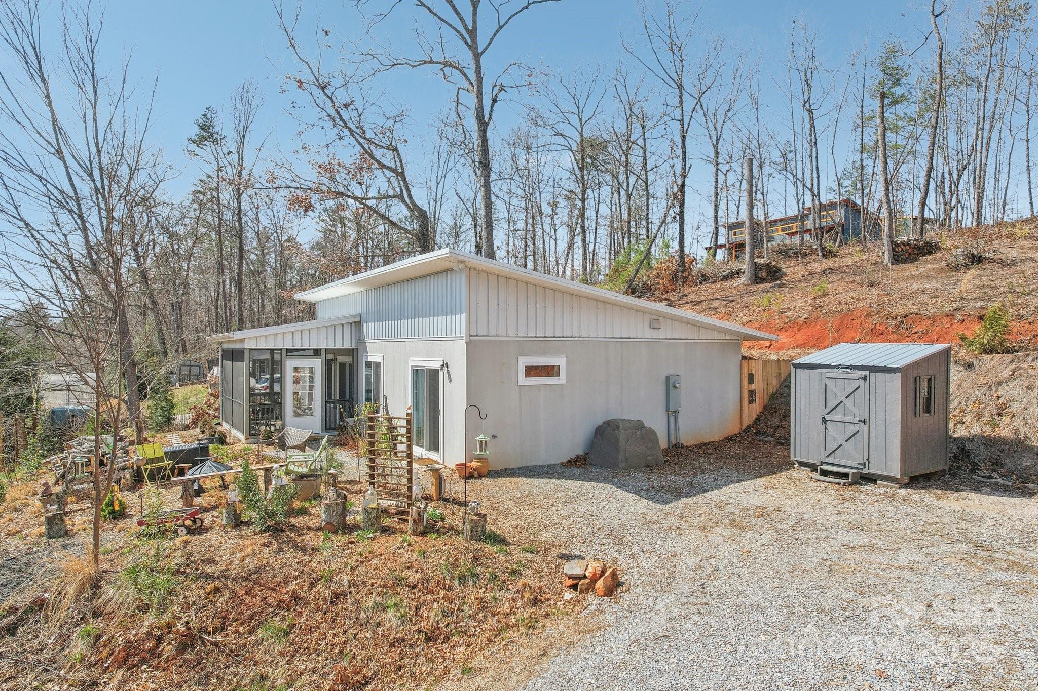 811 Golf Course Road Old Fort, NC 28762 - Photo 30 of 37 a front view of a house with a yard