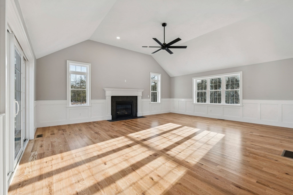 140 Ridge Road Rutland, MA 01543 - Photo 11 of 39 a view of empty room with windows and fireplace