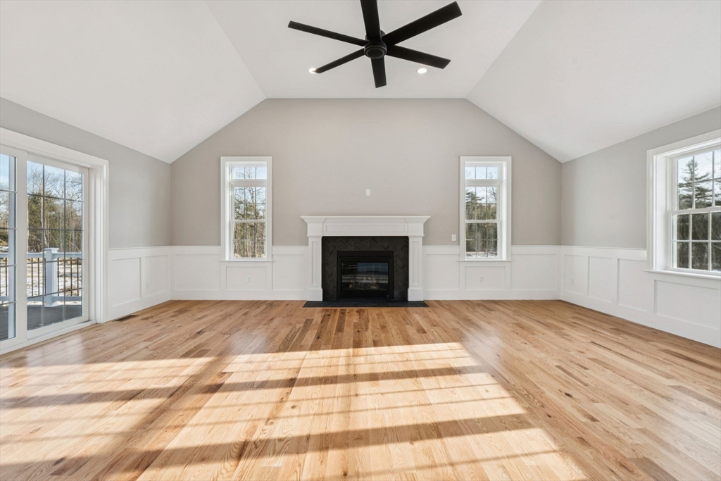 140 Ridge Road Rutland, MA 01543 - Photo 13 of 39 a view of an empty room with window and fireplace