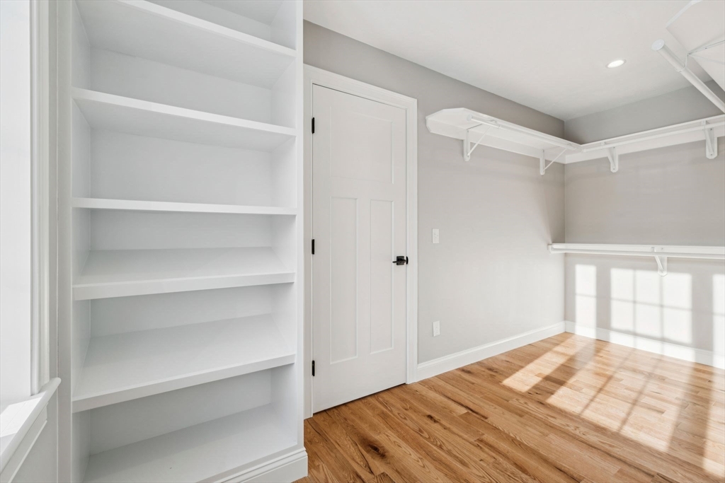 140 Ridge Road Rutland, MA 01543 - Photo 21 of 39 a bedroom with a bed and a window