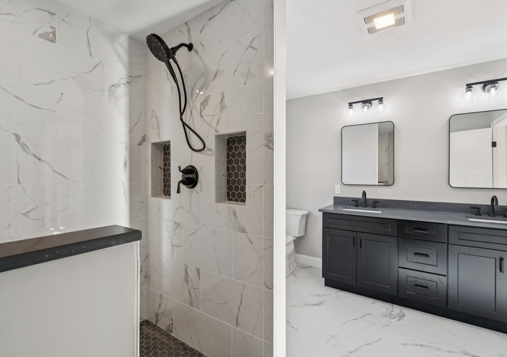 140 Ridge Road Rutland, MA 01543 - Photo 22 of 39 a bathroom with a bathtub sink and mirror