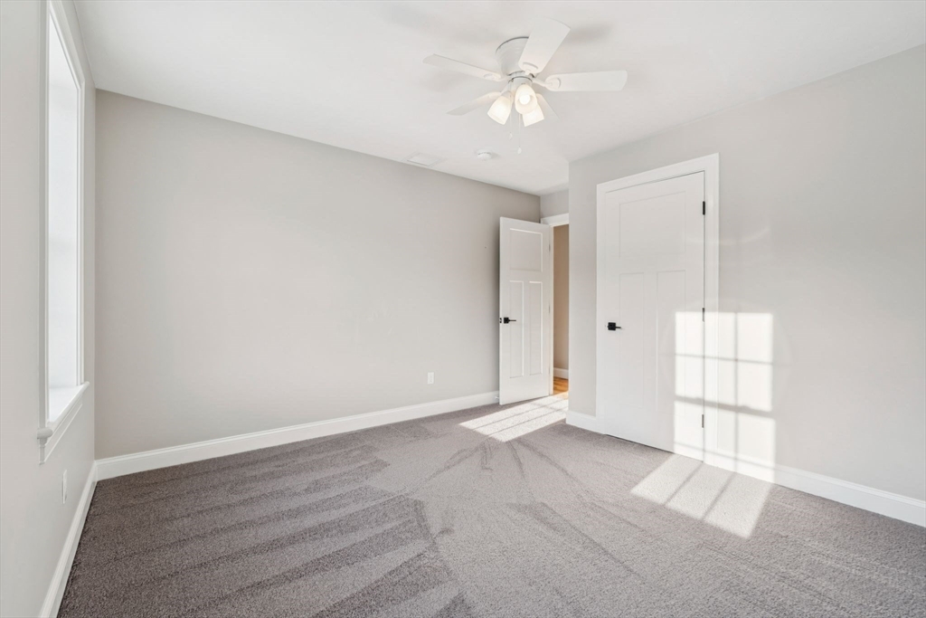 140 Ridge Road Rutland, MA 01543 - Photo 26 of 39 wooden floor in an empty room with a window