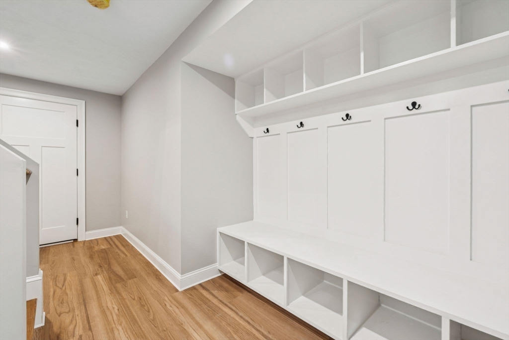 140 Ridge Road Rutland, MA 01543 - Photo 30 of 39 a view of walk in closet with wooden floor