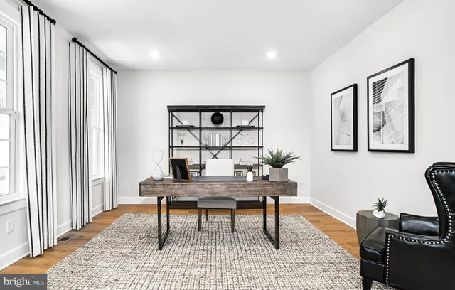 a workspace with furniture and window