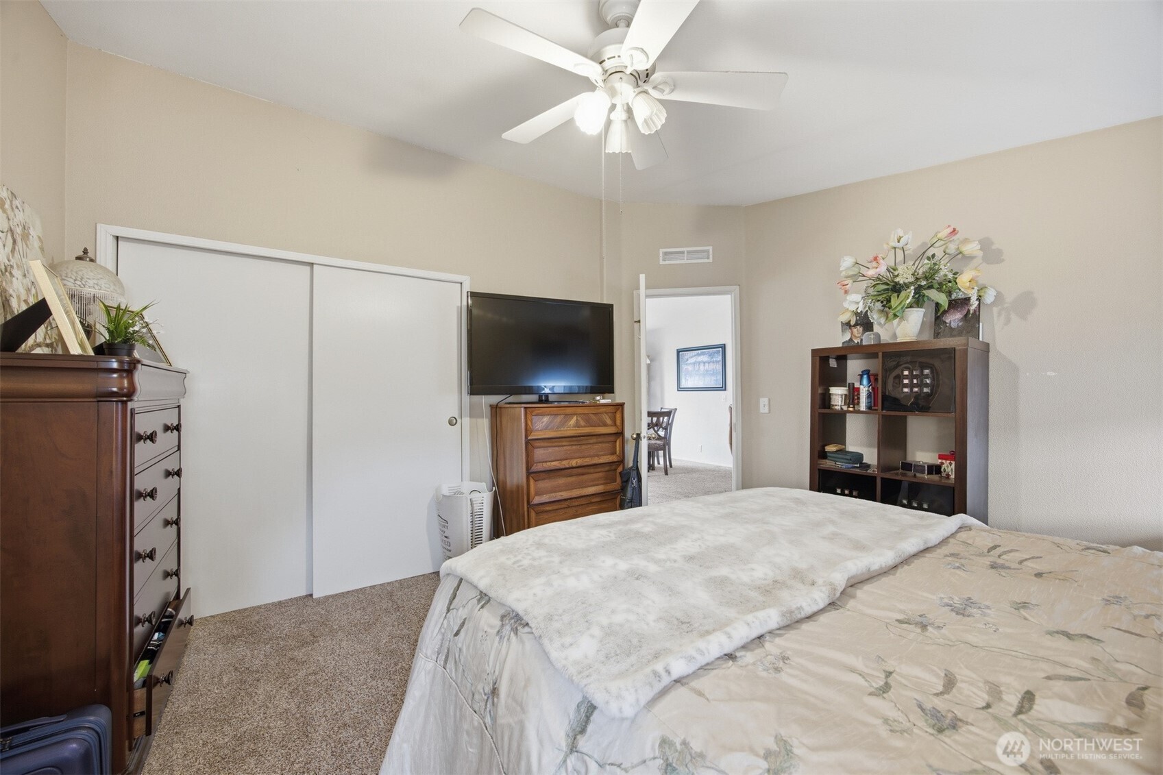 380 East Pole Road, Unit 6 Lynden, WA 98264 - Photo 23 of 40 a bedroom with a bed and a flat screen tv