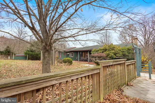 a view of a house with large windows