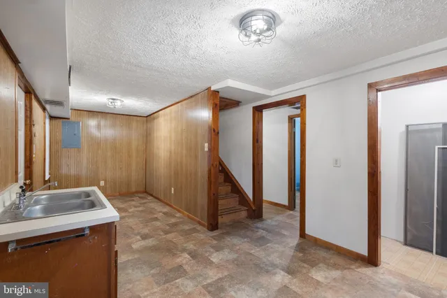 a view of a elevator and an empty room