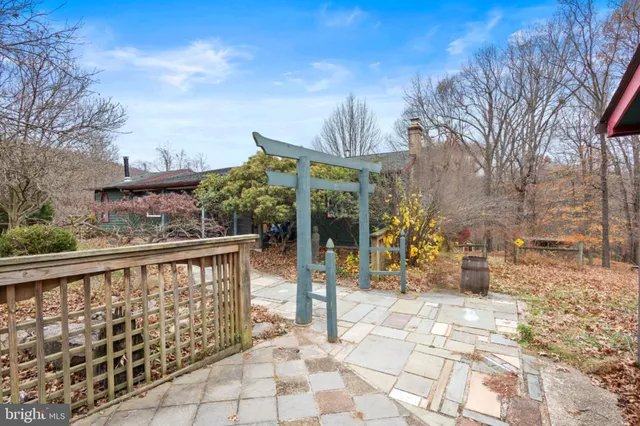 a view of a chairs and tables in the balcony