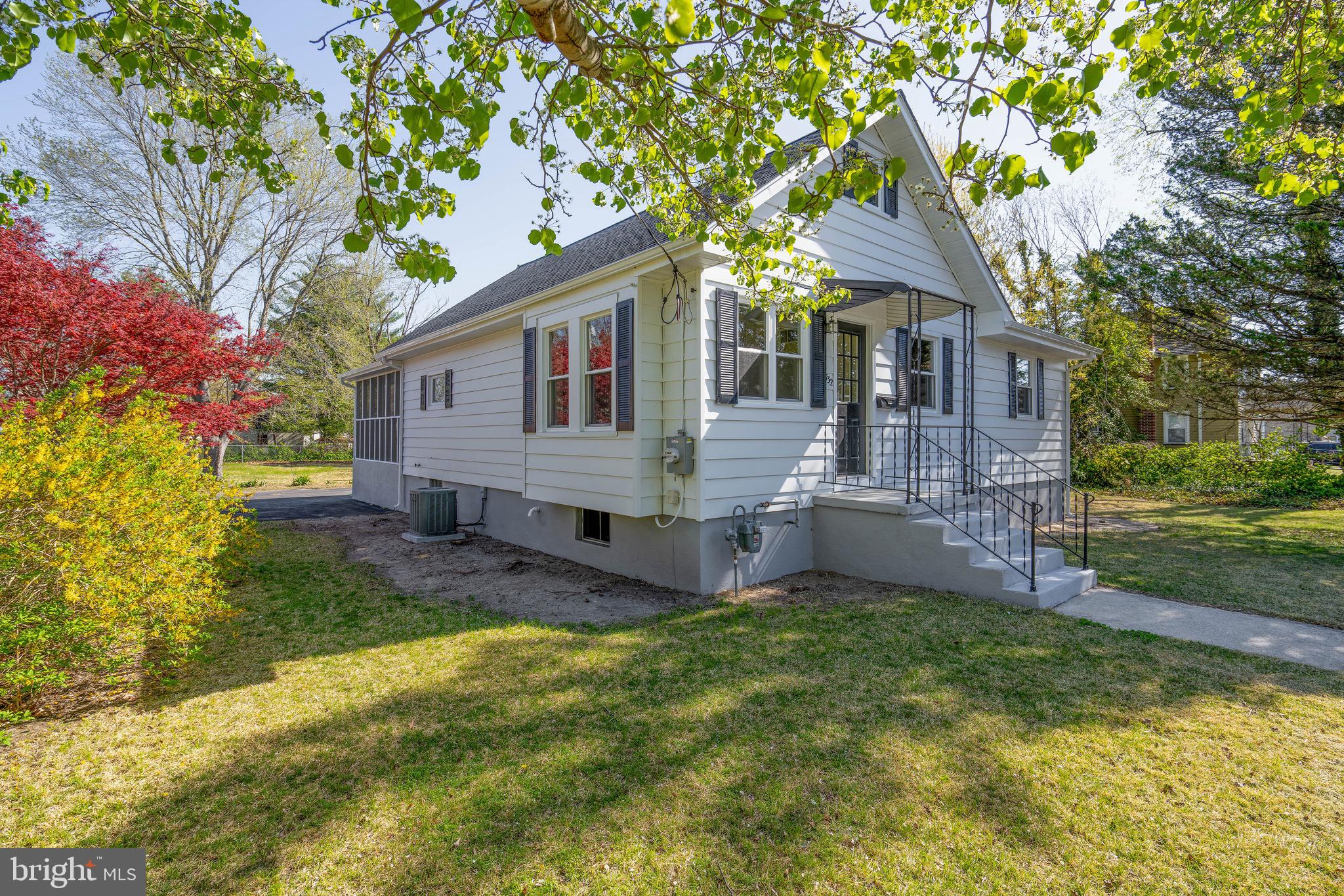 332 Maple Street Millville, NJ 08332 - Photo 2 of 24 a view of a house with a yard and tree s