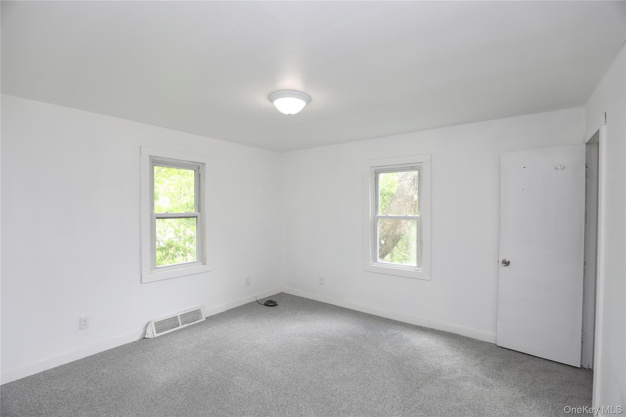 17 Rear Chapel Street Ellenville, NY 12428 - Photo 14 of 24 an empty room with windows