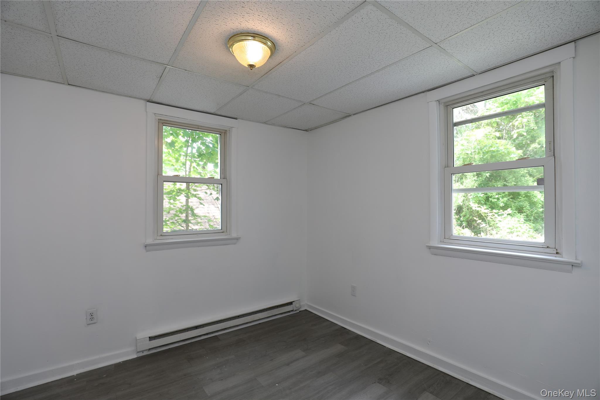 17 Rear Chapel Street Ellenville, NY 12428 - Photo 4 of 24 an empty room with a window
