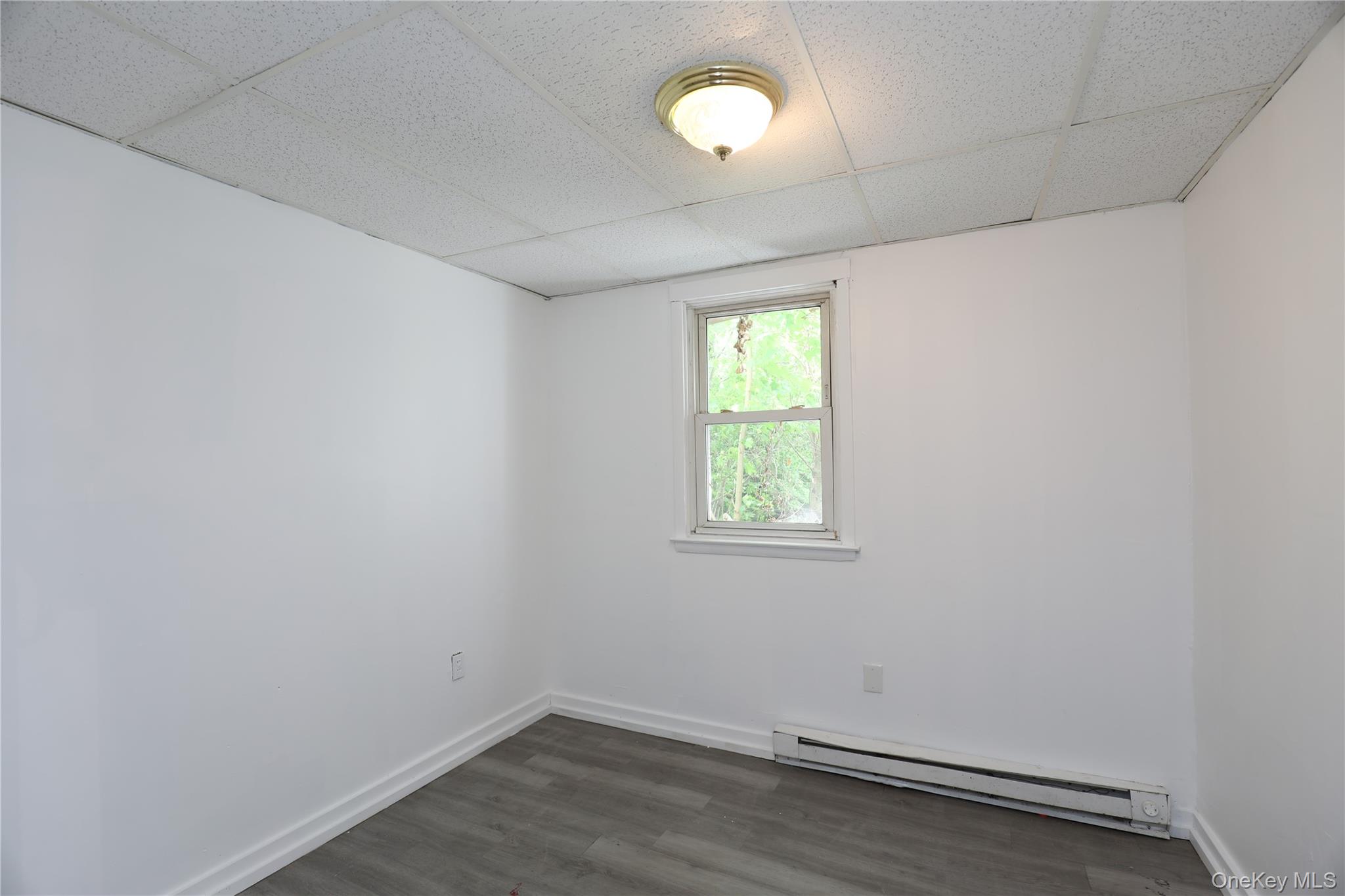 17 Rear Chapel Street Ellenville, NY 12428 - Photo 5 of 24 an empty room with a window