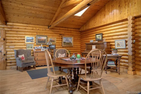 a view of a chairs and a room in a room