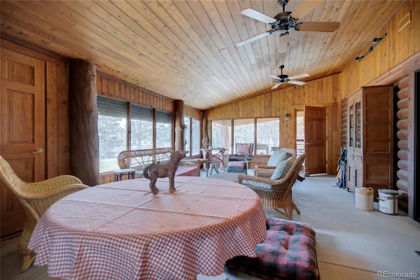 a kitchen with a cabinets and wooden floor