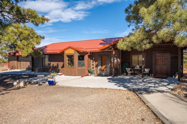 a front view of a house with a garage