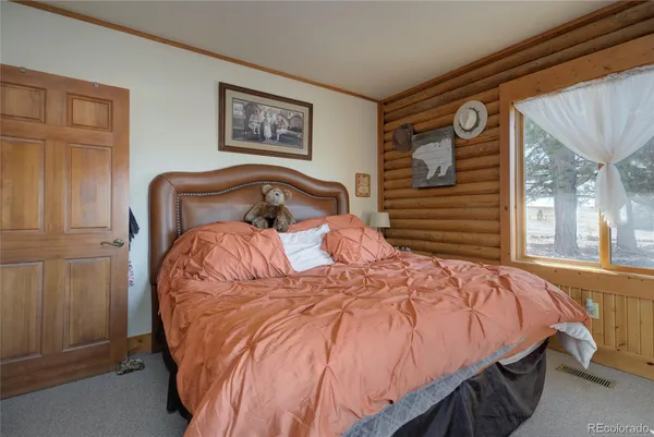 a kitchen with stove cabinets and refrigerator
