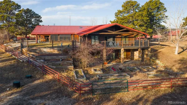 a front view of a house with yard