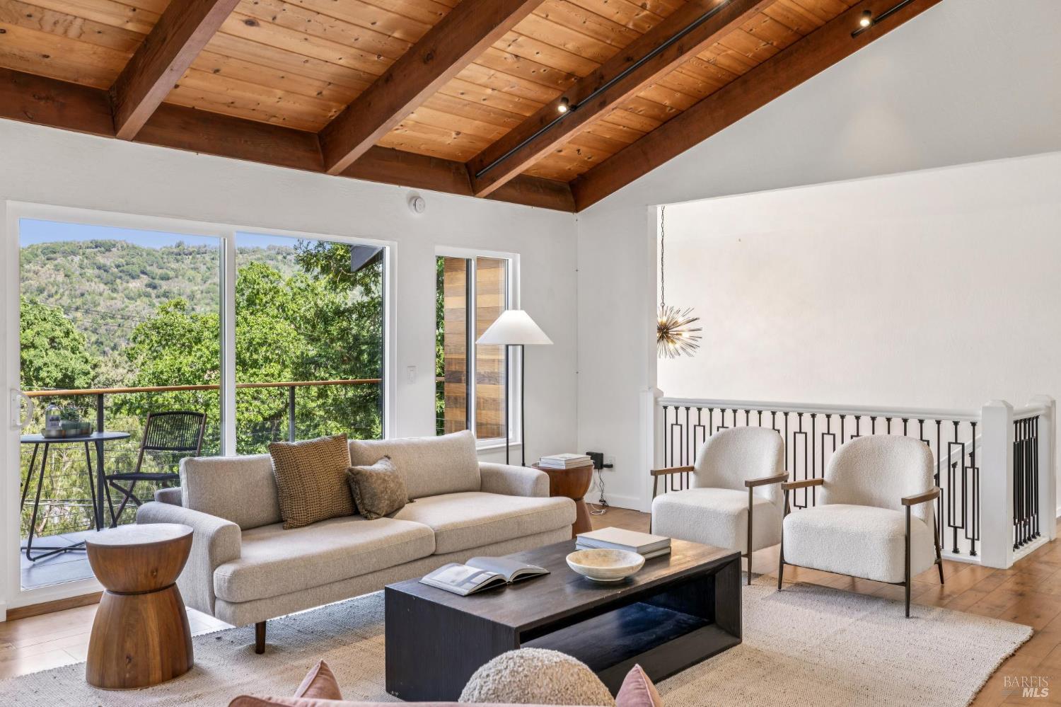 227 Coleman Drive San Rafael, CA 94901 - Photo 16 of 36 a living room with furniture and a large window