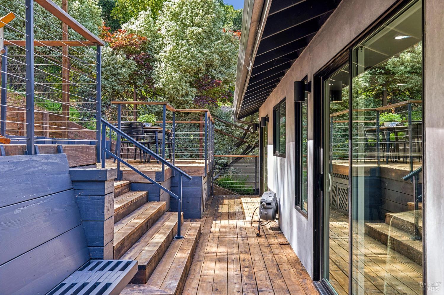 227 Coleman Drive San Rafael, CA 94901 - Photo 24 of 36 a view of balcony with wooden floor and fence and a bench