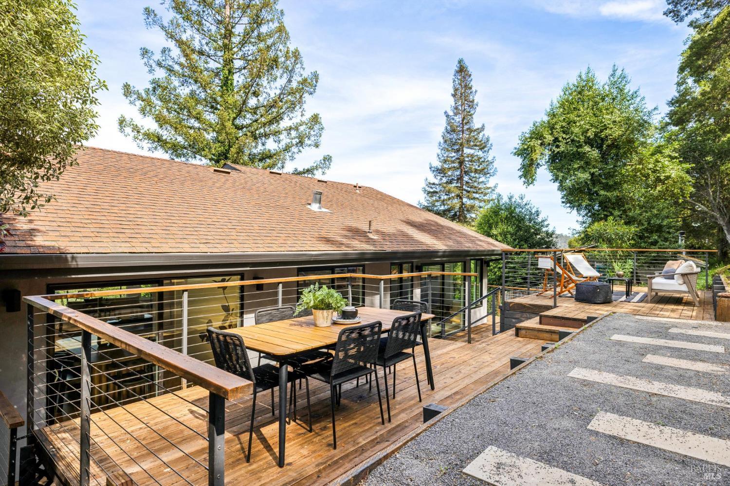 227 Coleman Drive San Rafael, CA 94901 - Photo 26 of 36 an outdoor sitting area with furniture and wooden floor