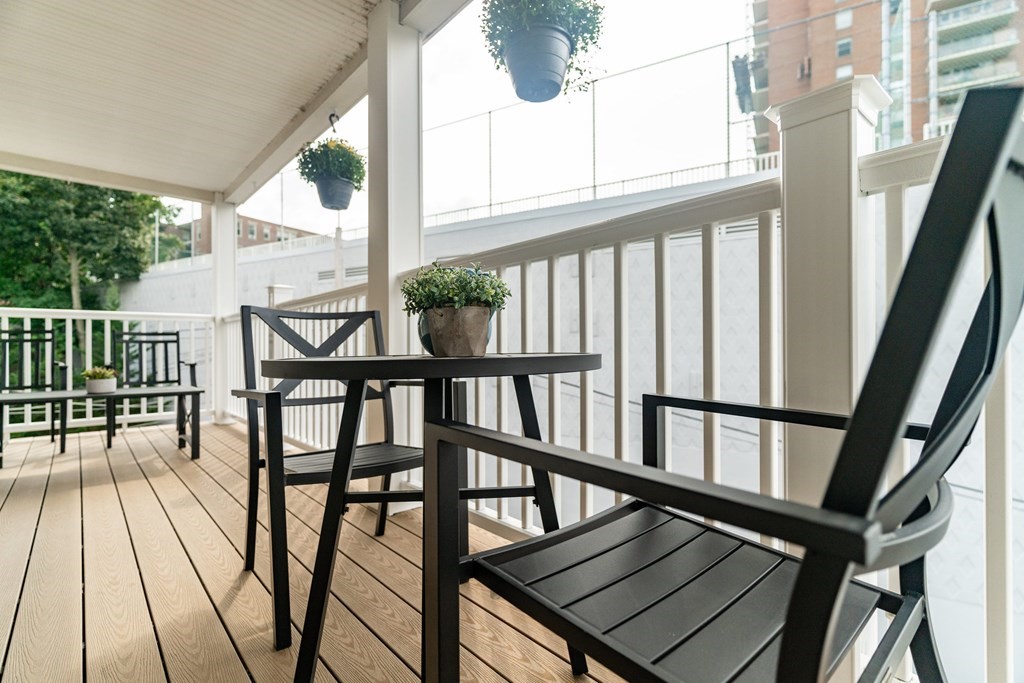 69 Parkton Road, Unit 3 Boston, MA 02130 - Photo 21 of 24 a view of balcony with wooden floor and chairs