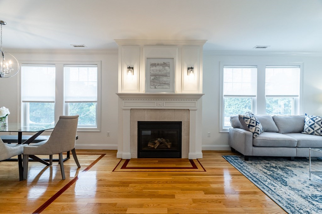 69 Parkton Road, Unit 3 Boston, MA 02130 - Photo 4 of 24 a living room with furniture and a fireplace