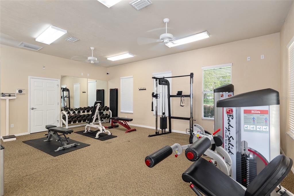8613 Southwest 76th Place Gainesville, FL 32608 - Photo 28 of 30 a view of a room with gym equipment