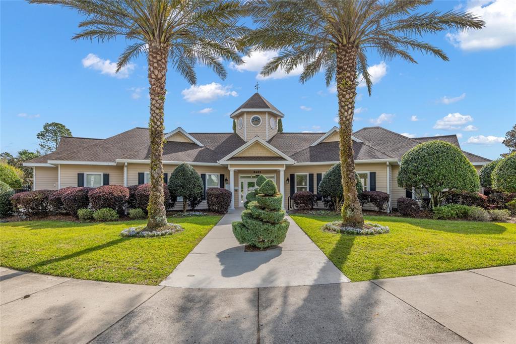 8613 Southwest 76th Place Gainesville, FL 32608 - Photo 30 of 30 a view of a house with swimming pool and a yard