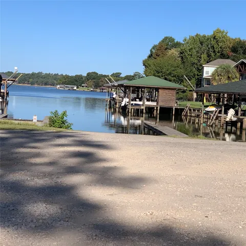 a view of a chairs and table in the patio
