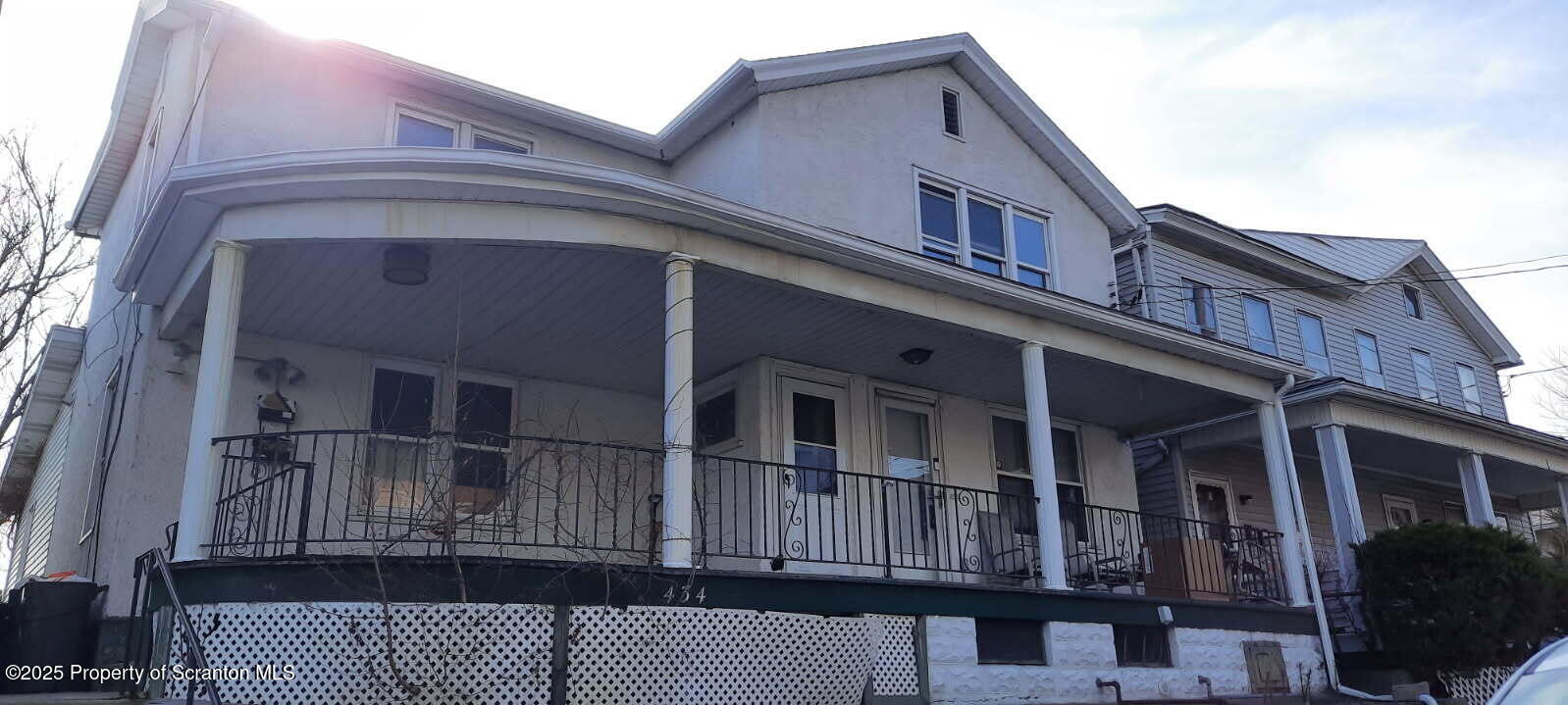 a front view of a house with a balcony