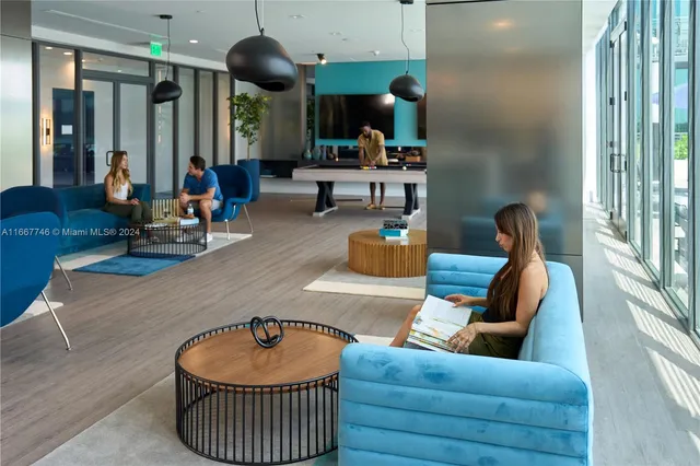 a room with gym equipment and a large window