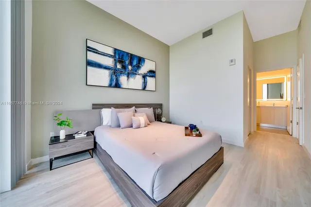 a bathroom with a shower a bathtub and a shower