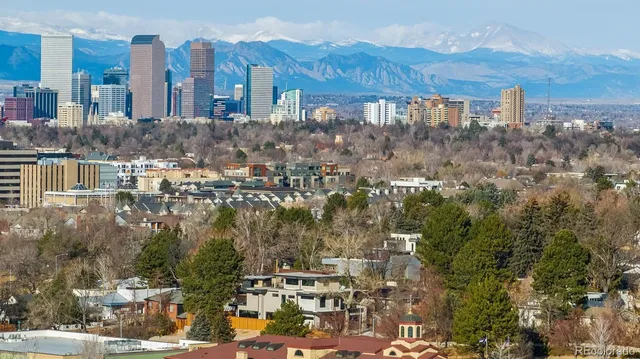a view of a city with tall buildings