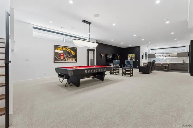 a room with furniture and a flat screen tv