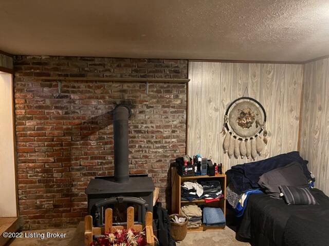 915 Penny Winkle Road Pleasureville, KY 40057 - Photo 15 of 35 basement wood burning stove