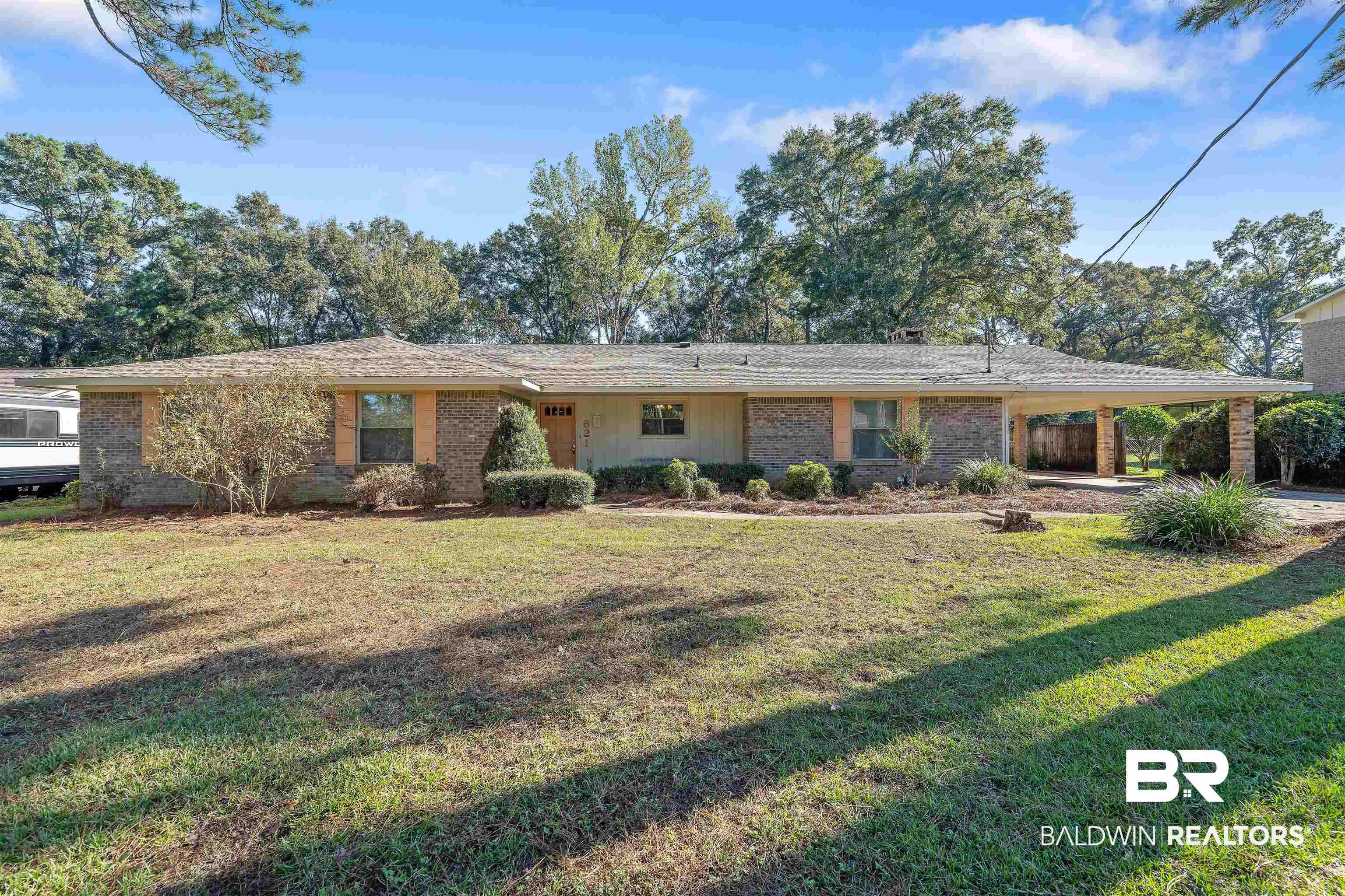 621 Spanish Main Spanish Fort, AL 36527 - Photo 2 of 29 Ranch-style home with a carport and a front yard