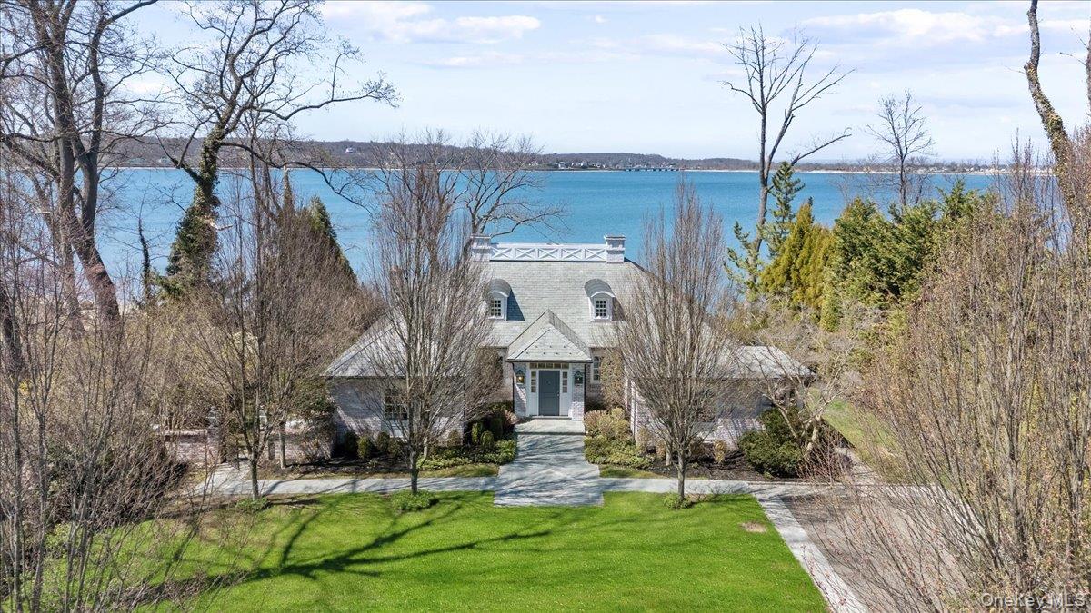 516 Centre Island Road Centre Island, NY 11771 - Photo 1 of 41 a front view of a house with garden