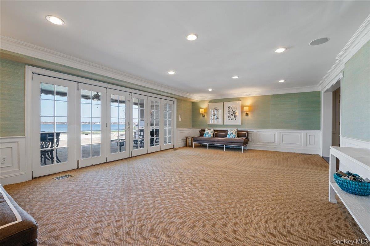 516 Centre Island Road Centre Island, NY 11771 - Photo 25 of 41 a view of an empty room with furniture and floor to ceiling window
