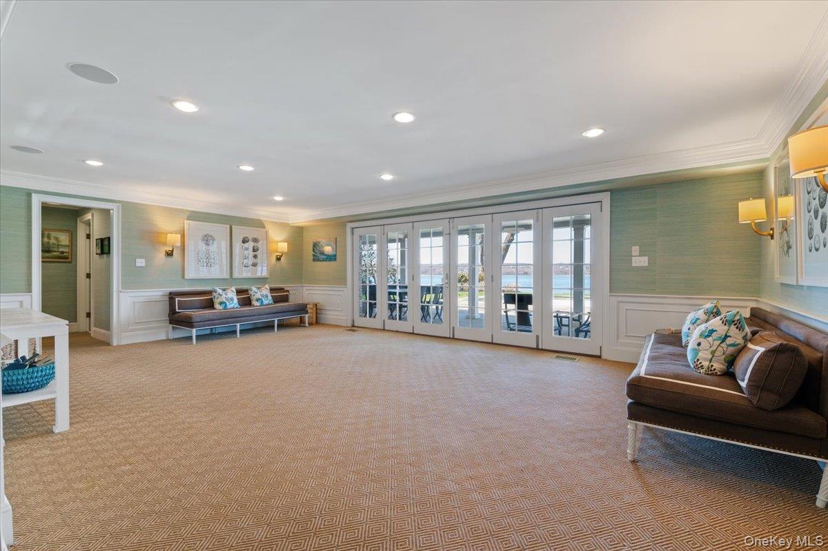 516 Centre Island Road Centre Island, NY 11771 - Photo 26 of 41 a living room with furniture and a large window