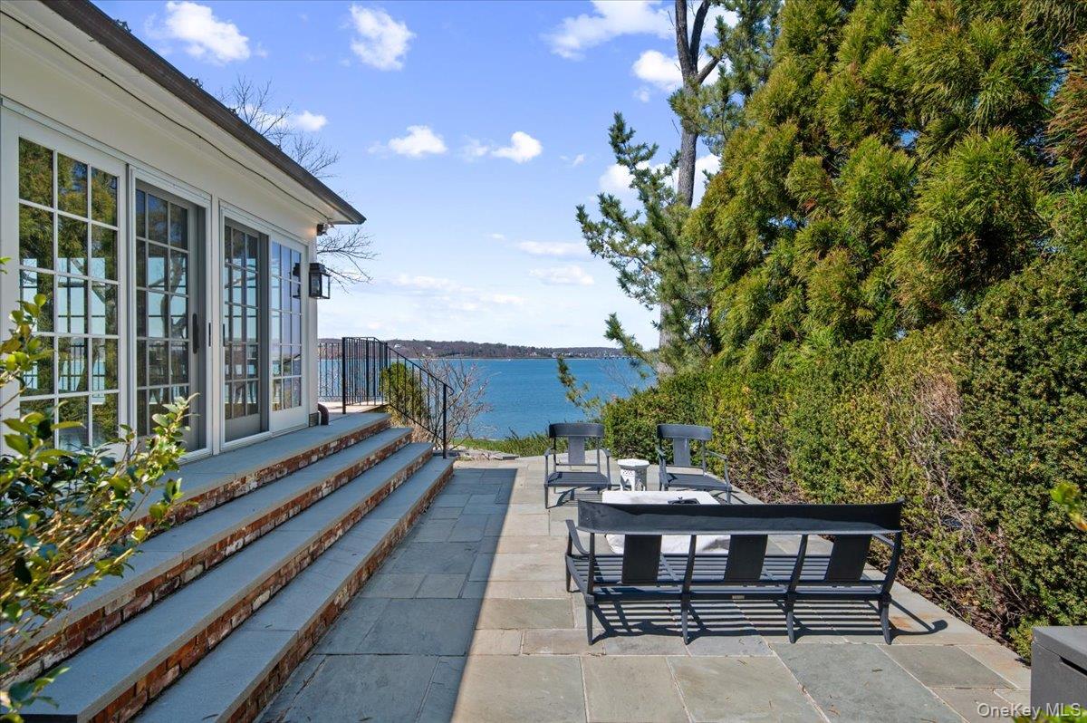 516 Centre Island Road Centre Island, NY 11771 - Photo 38 of 41 a view of a chairs and table in the balcony